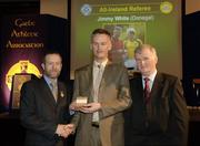 10 March 2006; Jimmy White, from Wexford, is presented with his award by GAA President Sean Kelly and Frank Burke, Chairman of the National Referees’ Committee, right, at the National Referees' Awards Banquet. Croke Park, Dublin. Picture credit: Ray McManus / SPORTSFILE