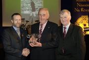 10 March 2006; John Moloney, from Tipperary, is presented with his Hall of Fame award by GAA President Sean Kelly and Frank Burke, Chairman of the National Referees’ Committee, right, at the National Referees' Awards Banquet. Croke Park, Dublin. Picture credit: Ray McManus / SPORTSFILE