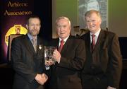 10 March 2006; Sean O'Connor, from Limerick, is presented with his 'Hall of Fame' award by GAA President Sean Kelly and Frank Burke, Chairman of the National Referees’ Committee, right, at the National Referees' Awards Banquet. Croke Park, Dublin. Picture credit: Ray McManus / SPORTSFILE