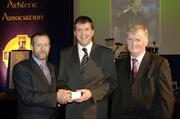 10 March 2006; Mick Monahan, from Kildare, is presented with his award by GAA President Sean Kelly and Frank Burke, Chairman of the National Referees’ Committee, right, at the National Referees' Awards Banquet. Croke Park, Dublin. Picture credit: Ray McManus / SPORTSFILE