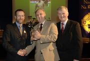 10 March 2006; Frank Murphy, Cork, is presented with his 'Hall of Fame' award by GAA President Sean Kelly and Frank Burke, Chairman of the National Referees’ Committee, right, at the National Referees' Awards Banquet. Croke Park, Dublin. Picture credit: Ray McManus / SPORTSFILE