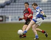 12 March 2006; Joe Higgins, Laois, in action against Ronan Sexton, Down. Allianz National Football League, Division 1B, Round 4, Laois v Down, O'Moore Park, Portlaoise, Co. Laois. Picture credit: Damien Eagers / SPORTSFILE