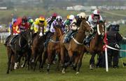 14 March 2006; Eventual winner Noland, with Ruby Walsh up, second from left (yellow silks), races in the field during the Anglo Irish Bank Supreme Novices' Hurdle. Cheltenham Festival, Prestbury Park, Cheltenham, England. Picture credit: Brian Lawless / SPORTSFILE