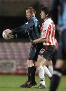 16 March 2006; Paul Crowley, Dublin City, in action against Ken Oman, Derry City. eircom League, Premier Division, Dublin City v Derry City, Dalymount Park, Dublin. Picture credit: Damien Eagers / SPORTSFILE