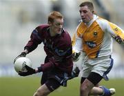 17 March 2006; Briain Geraghty, Salthill / Knocknacarra, in action against Sean Burns, St Gall's. AIB All-Ireland Club Senior Football Championship Final, St. Gall's v Salthill / Knocknacarra, Croke Park, Dublin. Picture credit: Damien Eagers / SPORTSFILE