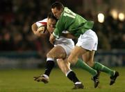 17 March 2006; Kieran Lewis, Ireland A, tackles Shaun Perry, England A. Rugby International, England A v Ireland A, Kingsholm, Gloucester, England. Picture credit: Brian Lawless / SPORTSFILE
