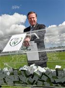 12 May 2014; Former Republic of Ireland International and Liverpool player Ronnie Whelan was at his old club Home Farm FC to launch the 2014 Irish Football National Draw with €200,000 worth of prizes for clubs and leagues. Prizes, licences, promotional materials and tickets are organised by the FAI with all proceeds from ticket sales going directly to clubs, making it a straightforward and risk free funding raising option. For information and to order tickets for your club, www.fai.ie/draw. Launch of FAI National Draw 2014, Home Farm FC, Whitehall, Dublin. Picture credit: David Maher / SPORTSFILE