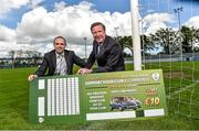 12 May 2014; Former Republic of Ireland International and Liverpool player Ronnie Whelan was at his old club Home Farm FC to launch the 2014 Irish Football National Draw with €200,000 worth of prizes for clubs and leagues. Prizes, licences, promotional materials and tickets are organised by the FAI with all proceeds from ticket sales going directly to clubs, making it a straightforward and risk free funding raising option. For information and to order tickets for your club, www.fai.ie/draw. Pictured are Former Republic of Ireland International and Liverpool player Ronnie Whelan, right, and Barry Gleeson, FAI Club and League Development manager. Launch of FAI National Draw 2014, Home Farm FC, Whitehall, Dublin. Picture credit: David Maher / SPORTSFILE