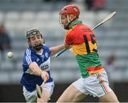 11 May 2014; Denis Murphy, Carlow, in action against Dwane Palmer, Laois. GAA All-Ireland Senior Hurling Championship Qualifier Group, Round 3, Laois v Carlow, O'Moore Park, Portlaoise, Co. Laois. Picture credit: David Maher / SPORTSFILE