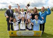 13 May 2014; Alan Kavanagh, left, Aviva, and Nixon Morton, right, FAI Schools Executive, with winners of the Girl's B section, St. Colmcilles, Ballybrack, Co. Dublin. Aviva Health FAI Primary School 5’s Leinster Finals, MDL Grounds, Navan, Co. Meath. Photo by Sportsfile