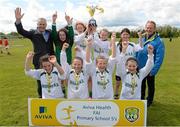 13 May 2014; Alan Kavanagh, left, Aviva, and Nixon Morton, right, FAI Schools Executive, with winners of the Girl's A section, Milltown National School, Co. Westmeath. Aviva Health FAI Primary School 5’s Leinster Finals, MDL Grounds, Navan, Co. Meath. Photo by Sportsfile