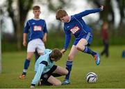 13 May 2014; Cuan Anthony, Bishop Foley Memorial School, Carlow, in action against Jamie Crilly, Our Lady of Good Counsel Boy's National School, Dun Laoghaire. Aviva Health FAI Primary School 5’s Leinster Finals, MDL Grounds, Navan, Co. Meath. Photo by Sportsfile