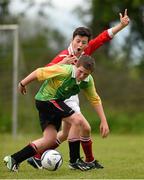 13 May 2014; Dylan O'Neill, Castlebridge, Co. Wexford, in action against, Daire McCoy, Monastery National School, Ardee, Co. Louth. Aviva Health FAI Primary School 5’s Leinster Finals, MDL Grounds, Navan, Co. Meath. Photo by Sportsfile