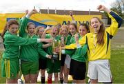 13 May 2014; Woodland NS, Letterkenny, Co. Donegal, players celebrate with the cup after winning the Girls section 1. Aviva Health FAI Primary School 5’s Ulster Finals, Ballyare, Donegal League HQ, Letterkenny, Co. Donegal. Picture credit: Oliver McVeigh / SPORTSFILE