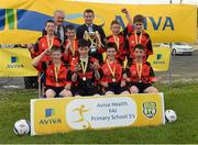 13 May 2014; Pupils from St Mary's NS, Castleblaney, Co. Monaghan, with Damien Flaherty, Aviva, centre, and Alex Harkin, FAI Schools, celebrate with the cup after winning the Boy's section B. Aviva Health FAI Primary School 5’s Ulster Finals, Ballyare, Donegal League HQ, Letterkenny, Co. Donegal. Picture credit: Oliver McVeigh / SPORTSFILE