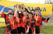 13 May 2014; Pupils from St Mary's NS, Castleblaney, Co. Monaghan, celebrate with the cup after winning the Boy's section B. Aviva Health FAI Primary School 5’s Ulster Finals, Ballyare, Donegal League HQ, Letterkenny, Co. Donegal. Picture credit: Oliver McVeigh / SPORTSFILE