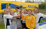 13 May 2014; Girls from Scoil Cholmcille, Greencastle, Innisowen, Co. Donegal, celebrate with the cup after winning the Girl's section B. Aviva Health FAI Primary School 5’s Ulster Finals, Ballyare, Donegal League HQ, Letterkenny, Co. Donegal. Picture credit: Oliver McVeigh / SPORTSFILE