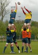 14 May 2014; Munster's Paul O'Connell wins possession in a lineout ahead of Billy Holland during squad training ahead of their side's Celtic League 2013/14 Play-off match against Glasgow Warriors on Friday. Munster Rugby Squad Training, Cork Institute of Technology, Bishopstown, Cork. Picture credit: Diarmuid Greene / SPORTSFILE