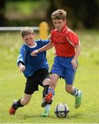 13 May 2014; Action from the Woodland NS, Letterkenny, Co. Donegal v Scoil Iosagain NS, Buncrana, Innisowen, Co. Donegal, game in the boys section. Aviva Health FAI Primary School 5’s Ulster Finals, Ballyare, Donegal League HQ, Letterkenny, Co. Donegal. Picture credit: Oliver McVeigh / SPORTSFILE