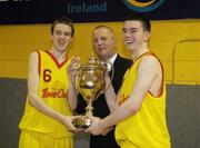 14 March 2006; Darren O'Moore, left, and Michael Chubb, St. Fintan's, are presented with the cup by Martin Hehir, Basketball Ireland Schools Development Officer. Schools League Basketball Finals, Boys U19A Final, St. Fintan's v Colaiste Eanna, National Basketball Arena, Tallaght, Dublin. Picture credit: Pat Murphy / SPORTSFILE