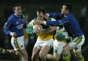 18 March 2006; Scott Brady, Offaly, is tackled by Kieran Donaghy, Kerry. Allianz National Football League, Division 1A, Round 5, Kerry v Offaly, Austin Stack Park, Tralee, Co. Kerry. Picture credit: Matt Browne / SPORTSFILE