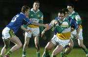 18 March 2006; Scott Brady, Offaly, in action against Colm Cooper, Kerry, left. Allianz National Football League, Division 1A, Round 5, Kerry v Offaly, Austin Stack Park, Tralee, Co. Kerry. Picture credit: Matt Browne / SPORTSFILE