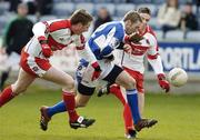 19 March 2006; Billt Sheehan, Laois, in action against Joe Diver, left, and Paul Cartin, Derry. Allianz National Football League, Division 1B, Round 5, Laois v Derry, O'Moore Park, Portlaoise, Co. Laois. Picture credit: Matt Browne / SPORTSFILE