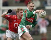 19 March 2006; Ger Brady, Mayo, in action against Anthony Lynch, Cork. Allianz National Football League, Division 1A, Round 5, Mayo v Cork, McHale Park, Castlebar, Co. Mayo. Picture credit: David Maher / SPORTSFILE