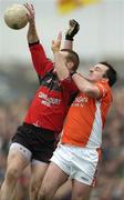 19 March 2006; Brendan Coulter, Down, is tackled by Aidan O'Rourke, Armagh. Allianz National Football League, Division 1B, Round 5, Down v Armagh, Pairc An Iuir, Newry, Co. Down. Picture credit: Pat Murphy / SPORTSFILE