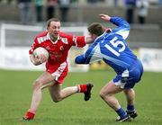 19 March 2006; Gerard Cavlan, Tyrone, is tackled by Rory Woods, Monaghan. Allianz National Football League, Division 1A, Round 5, Tyrone v Monaghan, Healy Park, Omagh, Co. Tyrone. Picture credit: Oliver McVeigh / SPORTSFILE
