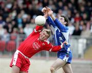 19 March 2006; Owen Mulligan, Tyrone, is tackled by Donal Morgan, Monaghan. Allianz National Football League, Division 1A, Round 5, Tyrone v Monaghan, Healy Park, Omagh, Co. Tyrone. Picture credit: Oliver McVeigh / SPORTSFILE