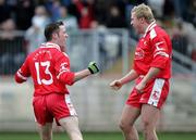 19 March 2006; Tyrone's Martin Penrose turns to celebrate with Owen Mulligan after scoring his side's only goal. Allianz National Football League, Division 1A, Round 5, Tyrone v Monaghan, Healy Park, Omagh, Co. Tyrone. Picture credit: Oliver McVeigh / SPORTSFILE