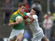 19 March 2006; Nigel Crawford, Meath, is tackled by Padraig O'Neill, Kildare. Allianz National Football League, Division 1B, Round 5, Meath v Kildare, Pairc Tailteann, Navan, Co. Meath. Picture credit: Brian Lawless / SPORTSFILE
