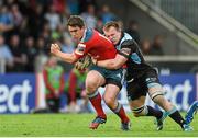16 May 2014; Ian Keatley, Munster, is tackled by Chris Fusaro, Glasgow Warriors. Celtic League 2013/14 Play-off, Glasgow Warriors v Munster, Scotstoun Stadium, Glasgow, Scotland. Picture credit: Diarmuid Greene / SPORTSFILE