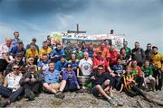 16 May 2014; Representatives and players with All Ireland football medals from each of the 32 counties at the top of Ireland’s highest mountain, Carrauntoohil, Co. Kerry, with the Sam Maguire cup, in aid of the Alan Kerins Project. Picture credit: Valerie O'Sullivan / SPORTSFILE