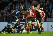 16 May 2014; CJ Stander, Munster, is tackled by Leone Nakarawa, left, and Alastair Kellock, Glasgow Warriors. Celtic League 2013/14 Play-off, Glasgow Warriors v Munster, Scotstoun Stadium, Glasgow, Scotland. Picture credit: Diarmuid Greene / SPORTSFILE