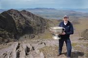 16 May 2014; Cork's Graham Canty, taking his turn to, bring the Sam Maguire Cup on the Summit of Carrauntoohil, MacGillycuddy's Reeks, Co Kerry, in a the unique event 'Sam to Summit' in aid of the Alan Kerins Projects which saw Sam Maguire and representatives and players with All Ireland football medals from each of the 32 counties reach the top of Ireland’s highest mountain Carrauntoohil, Co. Kerry. Picture credit: Valerie O'Sullivan / SPORTSFILE