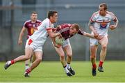 17 May 2014; Damian Dolan, Westmeath, in action against Andy McDonnell, left, and Paddy Keenan, Louth. Leinster GAA Football Senior Championship, Round 1, Westmeath v Louth, Cusack Park, Mullingar, Co. Westmeath. Photo by Sportsfile