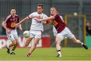17 May 2014; Andy McDonnell, Louth, in action against Ray Connellan, Westmeath. Leinster GAA Football Senior Championship, Round 1, Westmeath v Louth, Cusack Park, Mullingar, Co. Westmeath. Photo by Sportsfile