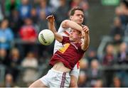 17 May 2014; Damian Dolan, Westmeath, in action against Shane Lennon, Louth. Leinster GAA Football Senior Championship, Round 1, Westmeath v Louth, Cusack Park, Mullingar, Co. Westmeath. Photo by Sportsfile