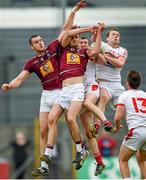 17 May 2014; David Duffy, left, and David McCormack, Westmeath, in action against Dessie Finnegan, and Mick Fanning, right, Louth. Leinster GAA Football Senior Championship, Round 1, Westmeath v Louth, Cusack Park, Mullingar, Co. Westmeath. Photo by Sportsfile