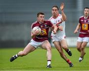 17 May 2014; Ger Egan, Westmeath, in action against John O'Brien, Louth. Leinster GAA Football Senior Championship, Round 1, Westmeath v Louth, Cusack Park, Mullingar, Co. Westmeath. Photo by Sportsfile