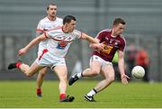 17 May 2014; Ger Egan, Westmeath, in action against Adrian Reid, Louth. Leinster GAA Football Senior Championship, Round 1, Westmeath v Louth, Cusack Park, Mullingar, Co. Westmeath. Photo by Sportsfile
