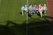 22 March 2006; Players from each of the participating counties chase Tim Crowley, Director of Forestry, Coillte, and Miriam O'Callaghan, President of the camogie Association, at the launch of the 2006 Coillte Camogie Development squads. The programme, part of the Strategic Plan for Camogie, aims to improve the skill level of U14 camogie players. Croke Park, Dublin. Picture credit: Brian Lawless / SPORTSFILE