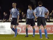 24 March 2006; Dejected Shelbourne players, Dave Rogers, left, Jim Crawford, centre and Ollie Cahill look on, after St. Patrick's Athletic's Trevor Molloy had scored his side's second goal. eircom League, Premier Division, St. Patrick's Athletic v Shelbourne, Richmond Park, Dublin. Picture credit: David Maher / SPORTSFILE