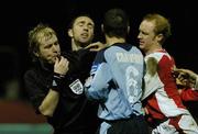 24 March 2006; Referee Alan Kelly seperates Paul Keegan, right, St. Patrick's Athletic, from Owen Heary, second from left, Shelbourne, before sending both player off. eircom League, Premier Division, St. Patrick's Athletic v Shelbourne, Richmond Park, Dublin. Picture credit: David Maher / SPORTSFILE