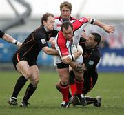 25 March 2006; Simon Best, Ulster, is tackled by Rhys Thomas and Ceri Sweeney. Newport Gwent Dragons. Celtic League 2005-2006, Ulster v Newport Gwent Dragons, Ravenhill, Belfast. Picture credit: Oliver McVeigh / SPORTSFILE