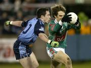 25 March 2006; Billy Joe Padden, Mayo, is tackled by Declan Lally, Dublin. Allianz National Football League, Division 1A, Round 6, Dublin v Mayo, Parnell Park, Dublin. Picture credit: Matt Browne / SPORTSFILE