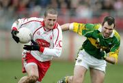 26 March 2006; Stephen O'Neill, Tyrone, gets away from Michael McCarthy, Kerry. Allianz National Football League, Division 1A, Round 6, Tyrone v Kerry, Healy Park, Omagh, Co. Tyrone. Picture credit: Oliver McVeigh / SPORTSFILE