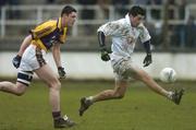 26 March 2006; Andrew McLoughlin, Kildare, in action against Thomas Howlin, Wexford. Allianz National Football League, Division 1B, Round 6, Kildare v Wexford, St. Conleth's Park, Newbridge, Co. Kildare. Picture credit: David Maher / SPORTSFILE